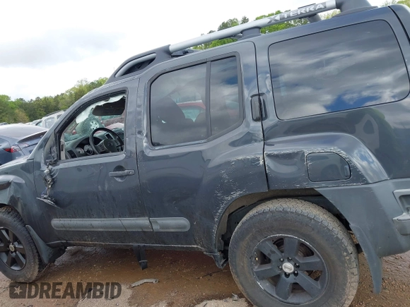 2014 Nissan Xterra X with VIN 5N1AN0NW4EN813172, listed as a IAAI auction lot 42010220 with 185,971 mi miles and . Bid and sale history available at DreamBid. Image 14.