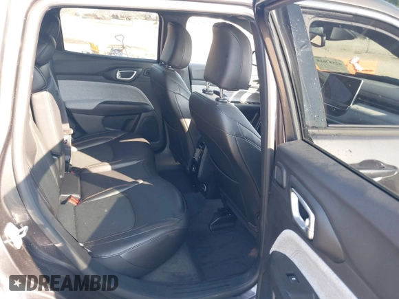 2023 Jeep Compass Latitude Lux with VIN 3C4NJDFN4PT521605, listed as a IAAI auction lot 42589618 with 11,579 mi miles and . Bid and sale history available at DreamBid. Image 8.