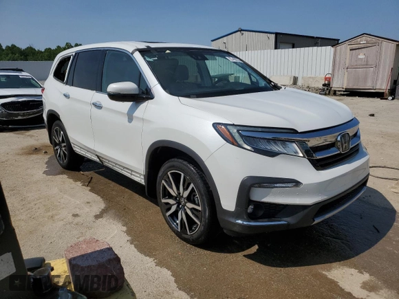 2022 Honda Pilot Elite with VIN 5FNYF6H08NB059590, listed as a Copart auction lot 57460235 with 67,593 mi miles and Salvage title. Bid and sale history available at DreamBid. Image 4.