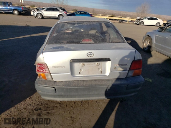 1996 Toyota Tercel DX z VIN JT2AC52L2T0193281, wystawiony jako Copart lot #85787774 z przebiegiem Nie podano mil oraz Szkody całkowita. Historia ofert i sprzedaży dostępna na DreamBid. Obrazek 6.
