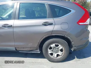 2013 Honda CR-V LX with VIN 3CZRM3H34DG705066, listed as a IAAI auction lot 42661478 with 318,027 mi miles and . Bid and sale history available at DreamBid. Image 20.