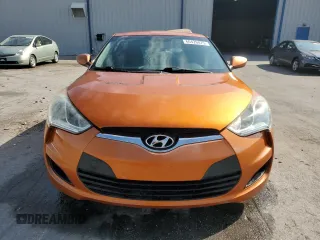2013 Hyundai Veloster w/Gray Int z VIN KMHTC6AD1DU103219, wystawiony jako Copart lot #60426875 z przebiegiem 135 869 mil mil oraz Szkoda całkowita • Salvage title. Historia ofert i sprzedaży dostępna na DreamBid. Obrazek 5.