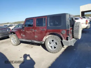 2010 Jeep Wrangler Unlimited Sahara with VIN 1J4BA5H1XAL196555, listed as a Copart auction lot 76704534 with 112,365 mi miles and Salvage Title. Bid and sale history available at carsss.com. Image 2.