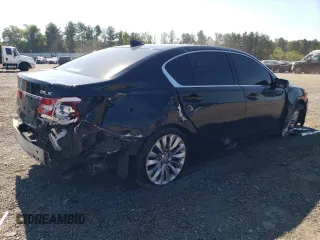 2014 Acura RLX Tech Pkg with VIN JH4KC1F52EC003785, listed as a Copart auction lot 70974324 with 135,080 mi miles and Salvage Title. Bid and sale history available at carsss.com. Image 3.