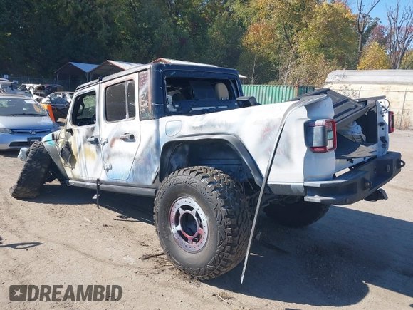 2020 Jeep Gladiator Sport S with VIN 1C6HJTAG3LL109494, listed as a IAAI auction lot 40677949 with 52,079 mi miles and . Bid and sale history available at DreamBid. Image 3.