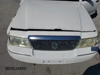 2003 Mercury Grand Marquis GS Convenience z VIN 2MEFM74W13X607924, wystawiony jako Copart lot #48960815 z przebiegiem 141 975 mil mil oraz Szkody całkowita. Historia ofert i sprzedaży dostępna na DreamBid. Obrazek 11.