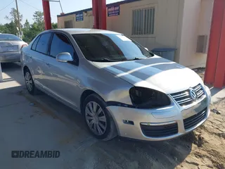 2009 Volkswagen Jetta S z VIN 3VWJM71K29M167114, wystawiony jako IAAI lot #42189455 z przebiegiem 170 663 mil mil oraz . Historia ofert i sprzedaży dostępna na DreamBid. Obrazek 1.