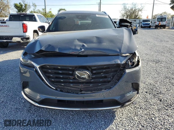 2021 Mazda CX-9 Grand Touring with VIN JM3TCADY1M0517525, listed as a Copart auction lot 43868965 with 123,602 mi miles and Salvage title. Bid and sale history available at DreamBid. Image 5.