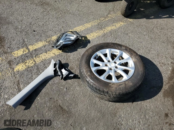 2018 Chevrolet Equinox LT z VIN 2GNAXSEV7J6185549, wystawiony jako Copart lot #53946125 z przebiegiem Nie podano mil oraz Szkoda całkowita • Salvage title. Historia ofert i sprzedaży dostępna na DreamBid. Obrazek 13.