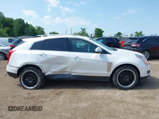 2013 Cadillac SRX Performance Collection with VIN 3GYFNHE3XDS520177, listed as a IAAI auction lot 42536457 with 217,963 mi miles and . Bid and sale history available at DreamBid. Image 13.