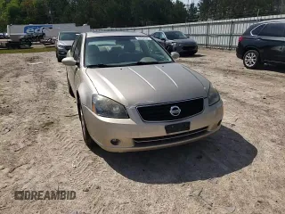 2006 Nissan Altima SL z VIN 1N4BL11D06C187454, wystawiony jako Copart lot #53852605 z przebiegiem 261 204 mil mil oraz Szkoda całkowita • Salvage title. Historia ofert i sprzedaży dostępna na DreamBid. Obrazek 13.