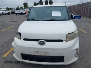 2014 Scion xB with VIN JTLZE4FEXEJ054060, listed as a IAAI auction lot 42096159 with 211,994 mi miles. Bid and sale history available at carsss.com. Image 12.