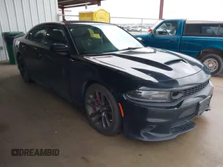 2021 Dodge Charger Scat Pack Widebody with VIN 2C3CDXGJ4MH520751, listed as a IAAI auction lot 41526166 with 85,014 mi miles. Bid and sale history available at carsss.com. Image 1.