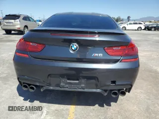 2015 BMW M6 z VIN WBSLX9C58FD160609, wystawiony jako Copart lot #56992535 z przebiegiem 52 324 mil mil oraz Tytuł czysty. Historia ofert i sprzedaży dostępna na DreamBid. Obrazek 6.