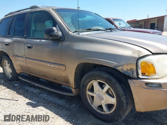 2003 GMC Envoy SLT with VIN 1GKDS13S432246741, listed as a IAAI auction lot 42051902 with 344,691 mi miles and . Bid and sale history available at DreamBid. Image 6.