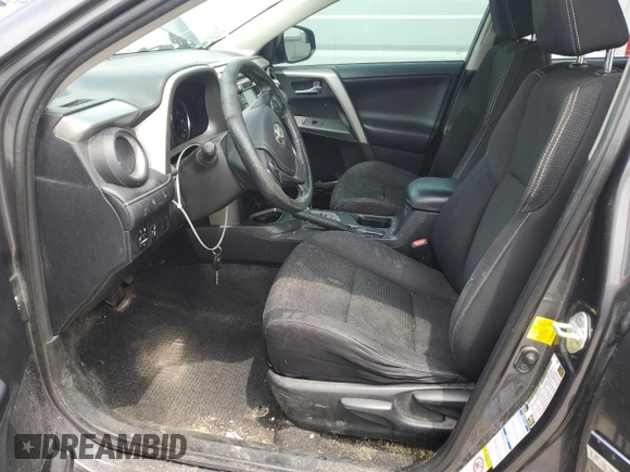 2016 Toyota RAV4 XLE with VIN 2T3RFREV0GW412875, listed as a Copart auction lot 59497545 with 226,604 mi miles and Salvage title. Bid and sale history available at DreamBid. Image 7.