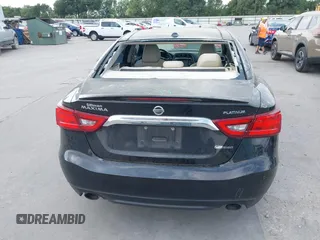 2017 Nissan Maxima SR z VIN 1N4AA6AP1HC405669, wystawiony jako IAAI lot #42157811 z przebiegiem 103 127 mil mil oraz . Historia ofert i sprzedaży dostępna na DreamBid. Obrazek 16.