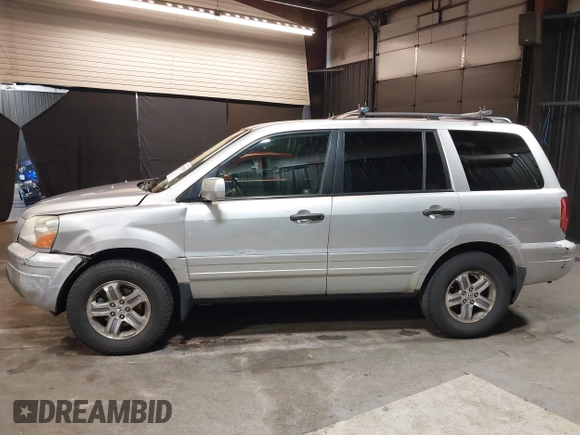 2005 Honda Pilot EX with VIN 5FNYF18465B031034, listed as a IAAI auction lot 41925858 with 194,211 mi miles and . Bid and sale history available at DreamBid. Image 14.
