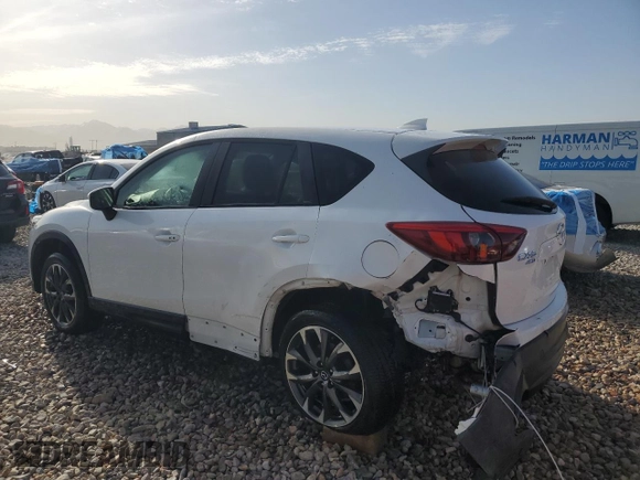 2016 Mazda CX-5 Grand Touring with VIN JM3KE4DY3G0688286, listed as a Copart auction lot 52182205 with 194,352 mi miles and Salvage Title. Bid and sale history available at DreamBid. Image 2.