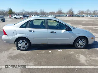 2004 Ford Focus SE with VIN 1FAFP34394W120884, listed as a IAAI auction lot 41663180 with 213,972 mi miles and . Bid and sale history available at DreamBid. Image 13.
