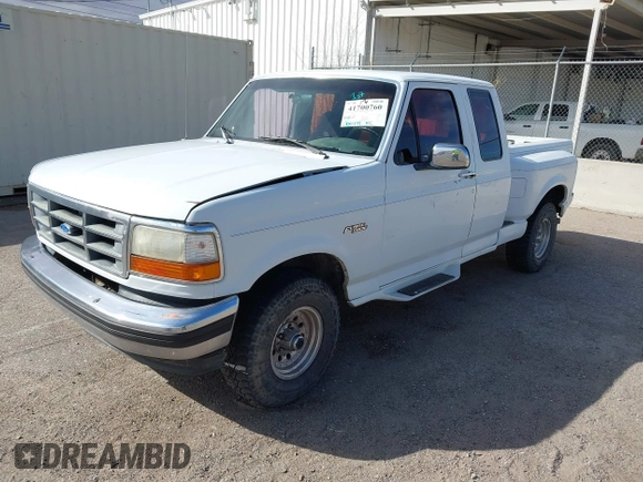 1993 Ford F-150 z VIN 1FTEX14H5PKA70504, wystawiony jako IAAI lot #41700760 z przebiegiem 208 794 mil mil oraz . Historia ofert i sprzedaży dostępna na DreamBid. Obrazek 2.