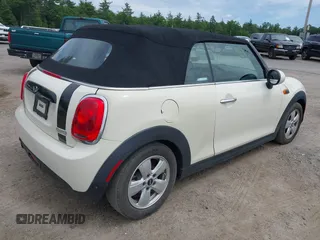 2019 MINI Convertible Cooper z VIN WMWWG5C52K3F79780, wystawiony jako IAAI lot #42622429 z przebiegiem 38 532 mil mil oraz . Historia ofert i sprzedaży dostępna na DreamBid. Obrazek 4.