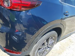2018 Mazda CX-5 Grand Touring with VIN JM3KFADM1J0322049, listed as a IAAI auction lot 41891079 with 174,939 mi miles and . Bid and sale history available at DreamBid. Image 19.