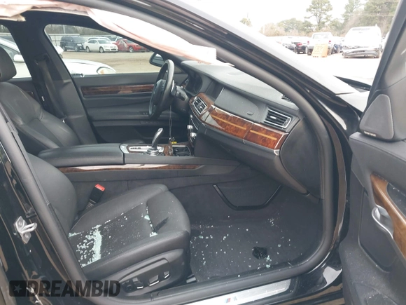2015 BMW 7 Series 740i с VIN WBAYA6C58FD826880, выставлен на аукционе IAAI как лот 41360429 с пробегом 125 130 миль миль и . История ставок и продаж доступна на DreamBid. Изображение 5.