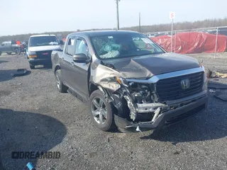 2022 Honda Ridgeline RTL z VIN 5FPYK3F51NB038239, wystawiony jako IAAI lot #41937070 z przebiegiem 39 012 mil mil oraz . Historia ofert i sprzedaży dostępna na DreamBid. Obrazek 1.