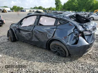 2024 Tesla Model Y Long Range z VIN 7SAYGDEEXRA324517, wystawiony jako Copart lot #55274615 z przebiegiem Nie podano mil oraz Szkoda całkowita • Salvage title. Historia ofert i sprzedaży dostępna na DreamBid. Obrazek 2.
