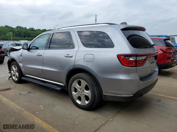 2014 Dodge Durango Limited with VIN 1C4SDJDT7EC358984, listed as a Copart auction lot 63957854 with 173,216 mi miles and Salvage Title. Bid and sale history available at carsss.com. Image 2.