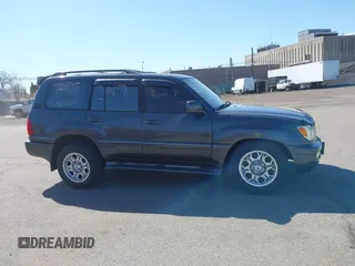 2003 Lexus LX with VIN JTJHT00W033531066, listed as a IAAI auction lot 41969617 with 209,710 mi miles. Bid and sale history available at carsss.com. Image 13.