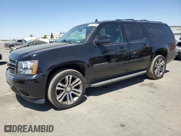 2014 Chevrolet Suburban LS with VIN 1GNSCHE03ER132039, listed as a Copart auction lot 68390234 with 129,744 mi miles and Salvage Title. Bid and sale history available at carsss.com. Image 1.