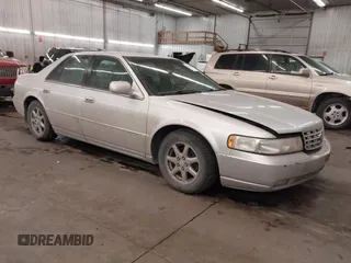 2003 Cadillac Seville Luxury SLS z VIN 1G6KS54Y93U200813, wystawiony jako IAAI lot #41544661 z przebiegiem 159 550 mil mil oraz . Historia ofert i sprzedaży dostępna na DreamBid. Obrazek 1.