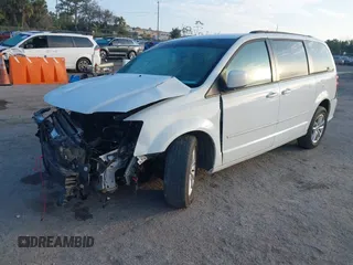 2016 Dodge Grand Caravan SXT with VIN 2C4RDGCGXGR257633, listed as a IAAI auction lot 41514684 with 108,743 mi miles and . Bid and sale history available at DreamBid. Image 2.