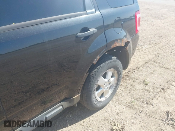 2011 Ford Escape XLT z VIN 1FMCU9DG6BKB40960, wystawiony jako IAAI lot #42183576 z przebiegiem 259 427 mil mil oraz . Historia ofert i sprzedaży dostępna na DreamBid. Obrazek 6.
