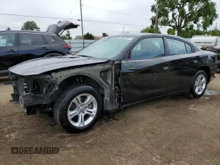 2022 Dodge Charger SXT with VIN 2C3CDXBGXNH200640, listed as a Copart auction lot 54198465 with 72,022 mi miles and Clean Title. Bid and sale history available at DreamBid. Image 1.