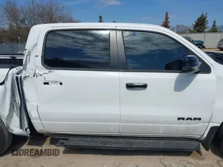 2023 Ram 1500 Laramie with VIN 1C6SRFJT8PN520610, listed as a IAAI auction lot 41898526 with 23,605 mi miles and . Bid and sale history available at DreamBid. Image 13.