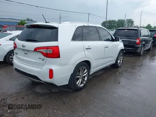 2014 Kia Sorento SX Limited with VIN 5XYKW4A75EG444230, listed as a IAAI auction lot 42540409 with 134,339 mi miles and . Bid and sale history available at DreamBid. Image 4.