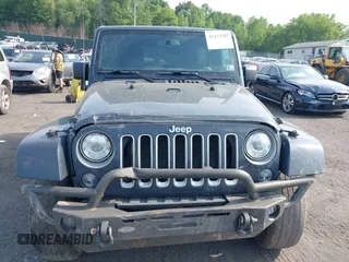2017 Jeep Wrangler Unlimited Sahara with VIN 1C4BJWEG4HL518945, listed as a IAAI auction lot 42423505 with 155,828 mi miles and . Bid and sale history available at DreamBid. Image 12.