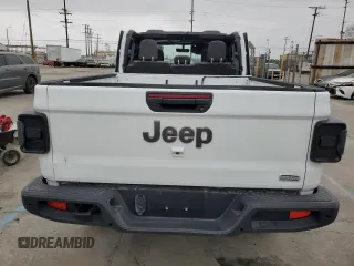 2023 Jeep Gladiator Overland z VIN 1C6HJTFG6PL516742, wystawiony jako Copart lot #65762465 z przebiegiem Nie podano mil oraz Szkoda całkowita • Salvage title. Historia ofert i sprzedaży dostępna na DreamBid. Obrazek 6.