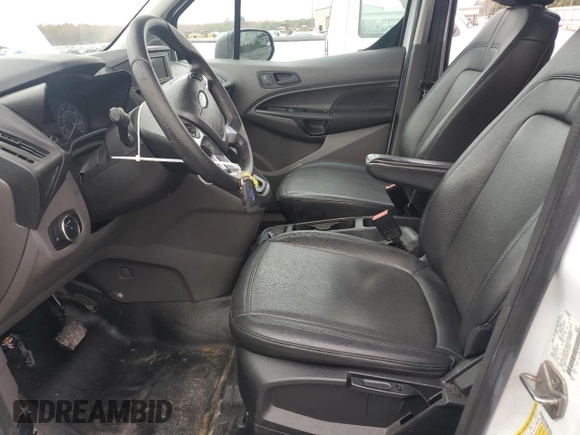2019 Ford Transit Connect XL with VIN NM0LS6E25K1400991, listed as a Copart auction lot 84215244 with 141,802 mi miles and Salvage title. Bid and sale history available at DreamBid. Image 7.