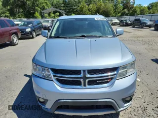 2013 Dodge Journey Crew with VIN 3C4PDCDG5DT599840, listed as a Copart auction lot 62542795 with 102,235 mi miles and Salvage title. Bid and sale history available at DreamBid. Image 5.