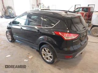 2014 Ford Escape SE with VIN 1FMCU9G95EUA16328, listed as a IAAI auction lot 42464235 with 108,570 mi miles and . Bid and sale history available at DreamBid. Image 3.