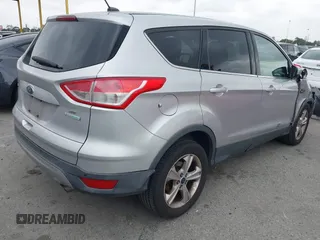 2015 Ford Escape SE with VIN 1FMCU0G95FUC81490, listed as a IAAI auction lot 42136791 with 140,967 mi miles. Bid and sale history available at carsss.com. Image 4.