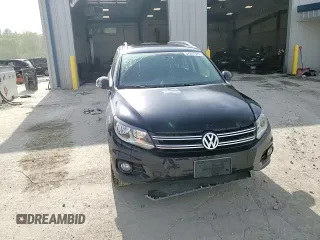 2013 Volkswagen Tiguan S with VIN WVGAV3AX1DW602083, listed as a Copart auction lot 57977515 with 114,375 mi miles and Clean title. Bid and sale history available at DreamBid. Image 14.