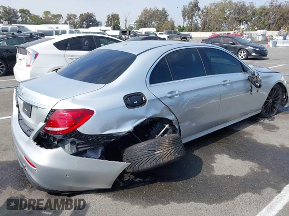 2018 Mercedes-Benz E 300 with VIN WDDZF4JB4JA427194, listed as a IAAI auction lot 42610082 with Not provided miles and . Bid and sale history available at DreamBid. Image 4.