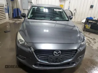 2017 Mazda 3 Touring with VIN 3MZBN1V74HM149040, listed as a Copart auction lot 59917855 with 204,440 mi miles and Salvage title. Bid and sale history available at DreamBid. Image 5.