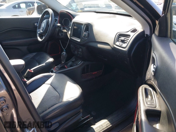 2019 Jeep Compass Trailhawk with VIN 3C4NJDDB3KT759849, listed as a IAAI auction lot 42141467 with 100,915 mi miles and . Bid and sale history available at DreamBid. Image 5.