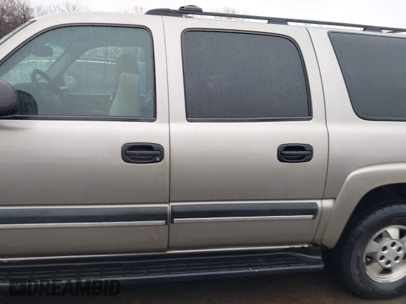 2003 Chevrolet Suburban LT z VIN 3GNFK16Z23G208162, wystawiony jako IAAI lot #41508649 z przebiegiem 329 695 mil mil oraz . Historia ofert i sprzedaży dostępna na DreamBid. Obrazek 13.
